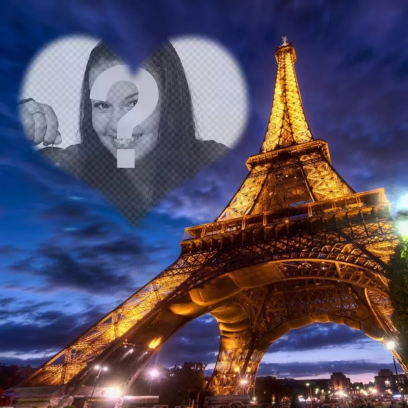 Fotomontaje en París con la Torre Eiffel iluminada y un marco en el cielo con forma de corazón semitransparente donde colocar tu..